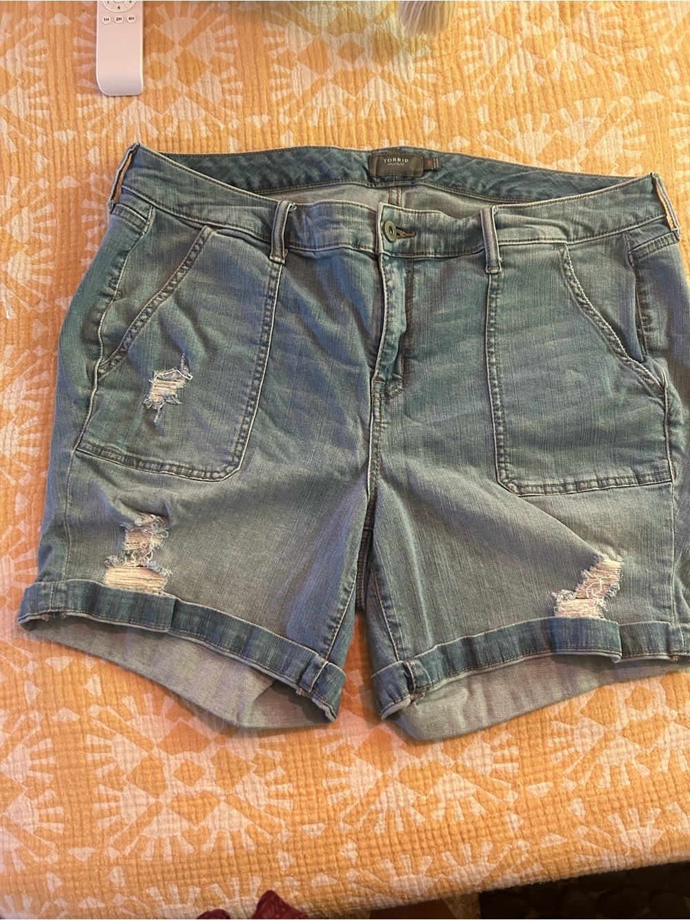 torrid faded blue distressed denim shorts
